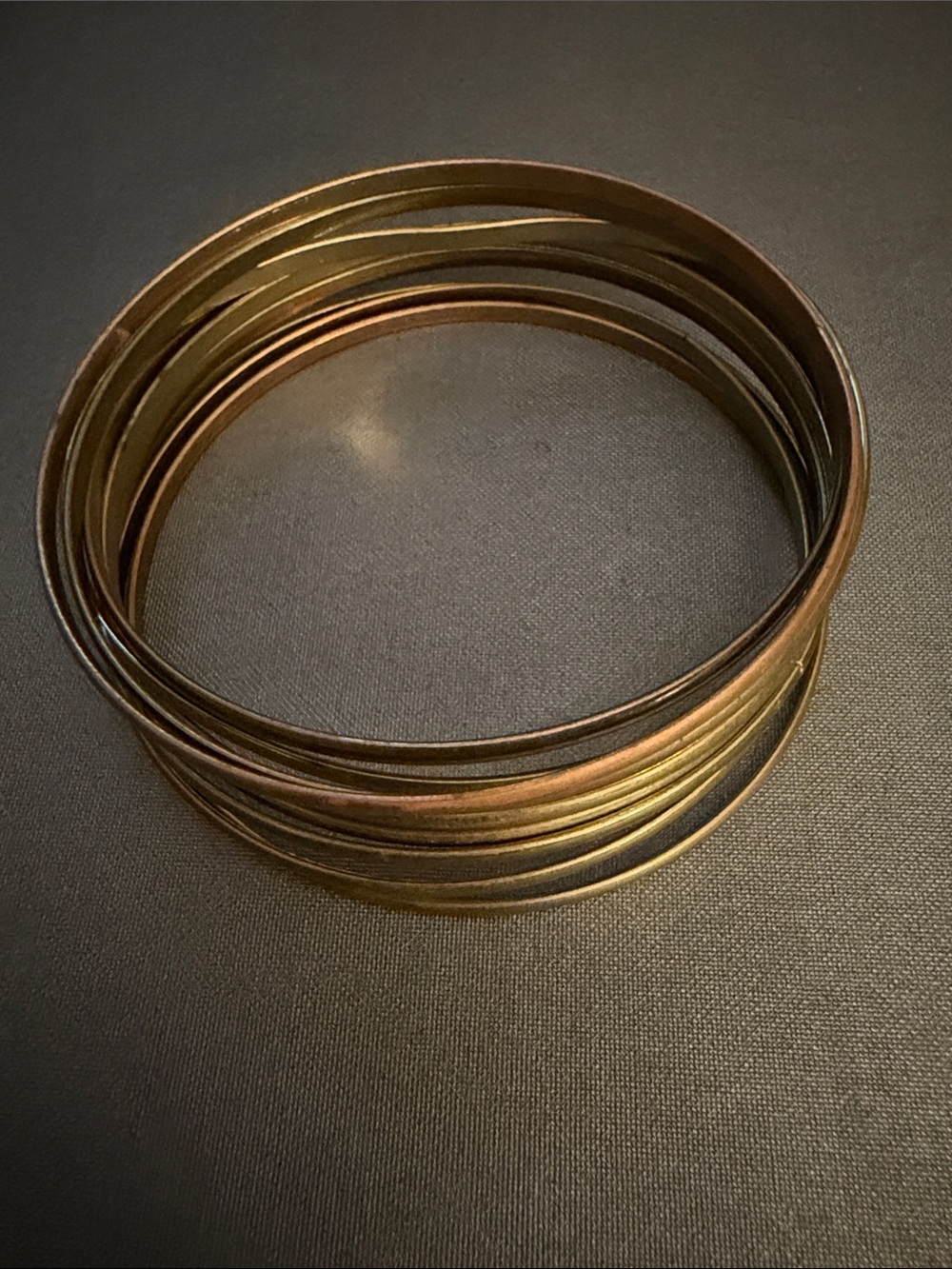 Group of 9 Various Colored Metal Bangles Bracelets